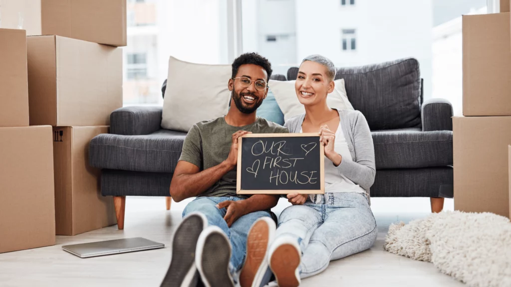 image illustrating a first-time homebuyer couple in their first home